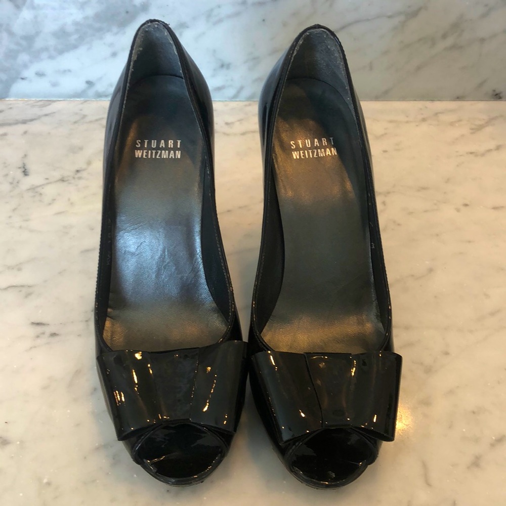 Stuart Weitzman black patented leather heels.
